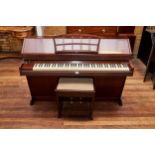 AN ART DECO STYLE EAVESTAFF ""PIANETTE"" MINI PIANO in a mahogany case together with a hinged seat