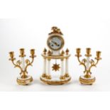 A LATE 19TH CENTURY FRENCH ORMOLU AND WHITE MARBLE EMPIRE STYLE CLOCK GARNITURE, circular floral