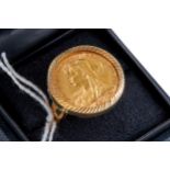 A GENTS GOLD 1893 HALF SOVEREIGN RING, 9ct gold mount, approximately 9.8 grams, size O.