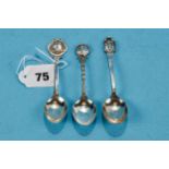 A GEORGE VI SILVER GOLF AWARD SPOON with golfing figure terminal, Sheffield 1937, another Chester