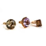 A 9CT GOLD AMETHYST SET DRESS RING and two 9ct gold stone set DITTOS, sizes O, P and R,