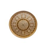 AN IMPRESSIVE LARGE CIRCULAR CAIROWARE BRASS AND MIXED METAL TRAY decorated with roundels and