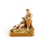 A LATE 19TH CENTURY AUSTRIAN ROYAL DUX PORCELAIN GROUP depicting a female and two grazing sheep on