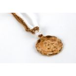 A 9CT YELLOW GOLD ST CHRISTOPHER PENDANT on a 9ct gold NECKCHAIN, approximately 5 grams.