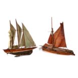 AN EARLY 20TH CENTURY WOODEN MODEL OF A THREE MASTED BOAT, 7 ins long and a ditto model of a flat