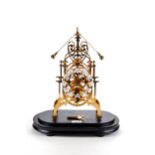 A REPRODUCTION VICTORIAN STYLE SKELETON TIMEPIECE with unusual rocking ball anchor escapement,