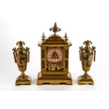 A 19TH CENTURY ORIENTAL INFLUENCE BRASS/MIXED METAL FRENCH CLOCK GARNITURE, circular copper dial