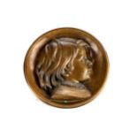 A 19TH CENTURY CONTINENTAL CIRCULAR CAST BRONZE PLAQUE of a young child, signed Matagrin, 1873, 8