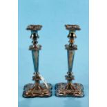 A PAIR OF 19TH CENTURY SHEFFIELD PLATE ON COPPER CANDLESTICKS with detachable nozzles and foliate