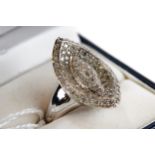 A LADY'S 14CT WHITE GOLD MULTI DIAMOND SET RING, stamped 14.585, size T, approximately 8.7 grams.