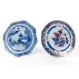 AN 18TH CENTURY CHINESE PORCELAIN OCTAGONAL SHAPED PLATE decorated with a riverside landscape in