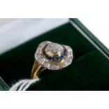 A 9CT YELLOW GOLD ART DECO INFLUENCE SAPPHIRE AND DIAMOND RING, size P, approximately 3.4 grams.