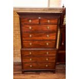 A GEORGE III MAHOGANY CHEST ON CHEST, the dentil cornice above a fluted frieze, two short and