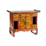 A 20TH CENTURY ORIENTAL FLORAL DECORATED CABINET, metal mounts, two frieze drawers, central cupboard