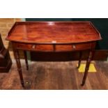 A REGENCY PERIOD MAHOGANY BOW FRONTED DRESSING TABLE, the three quarter gallery top above two frieze