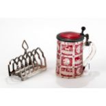 A LATE 19TH CENTURY BOHEMIAN RUBY FLASH STEIN, pewter mounted with panels of deer and dogs, 5 1/4