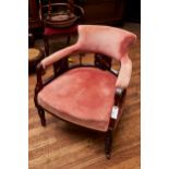 A LATE 19TH CENTURY ROSEWOOD TUB CHAIR with upholstered yoke back and inlaid pierced splats, stuff