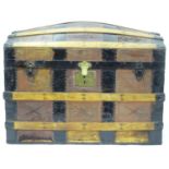 An early 20thC convex topped trunk. Approx. 32 1/2" wide Please Note - we do not make reference to