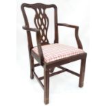 A 20thC Chippendale style carver chair. Approx. 36 1/2" tall Please Note - we do not make