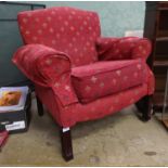 A upholstered armchair with fleur de lys decoration Please Note - we do not make reference to the