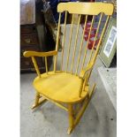 A late 20th / early 21st rocking chair Please Note - we do not make reference to the condition of