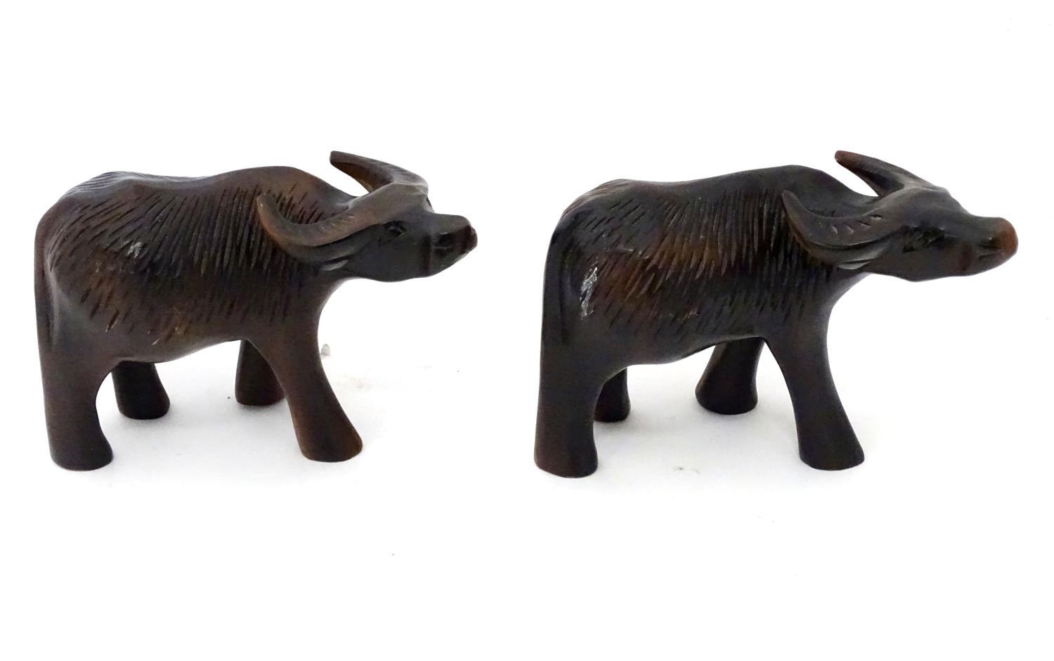 A pair of carved wooden buffalo / ox Please Note - we do not make reference to the condition of lots - Image 3 of 4