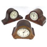 Three mantel clocks to include a Napoleon hat style clock (3) Please Note - we do not make reference