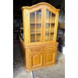 A 20thC oak glazed dresser / cupboard. Approx. 75" tall Please Note - we do not make reference to