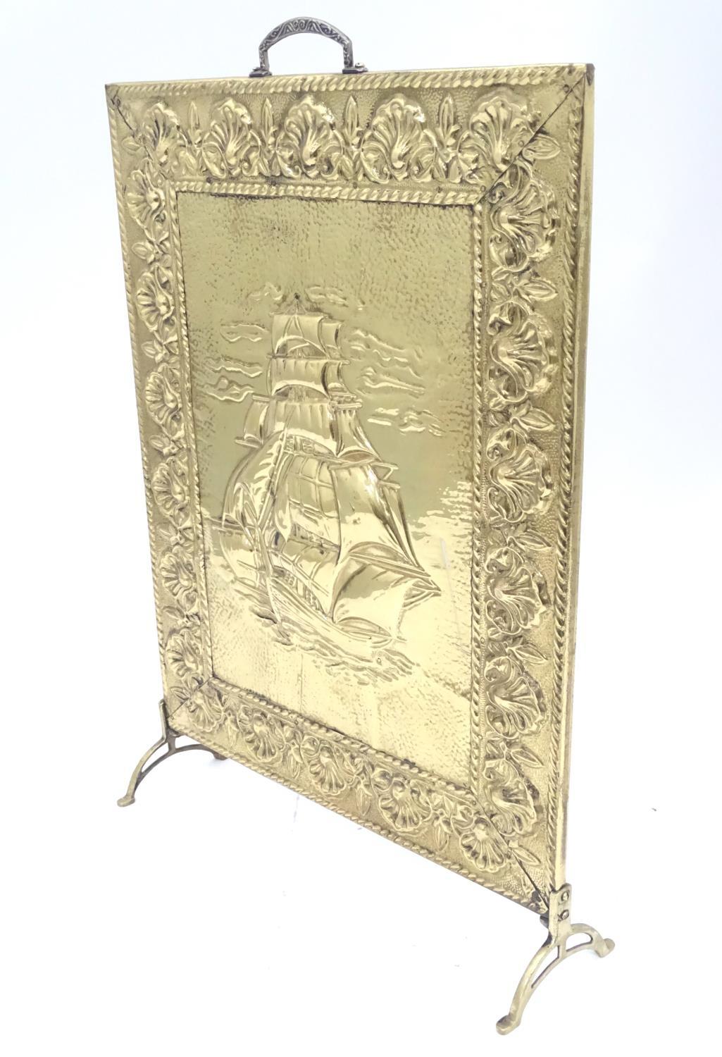 A brass fire guard with ship decoration. Approx. 26 1/2" tall Please Note - we do not make reference - Image 5 of 5