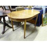 A 20thC flamed mahogany dining table. Approx. 50" long Please Note - we do not make reference to the