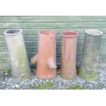 Four assorted tall chimney pots (4) Please Note - we do not make reference to the condition of