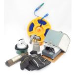 A quantity of assorted items to include a Braun projector, a Stanley tool belt, a space saving