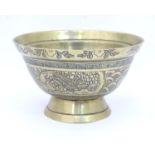 A large Oriental brass bowl with phoenix decoration. Stamped under. Please Note - we do not make