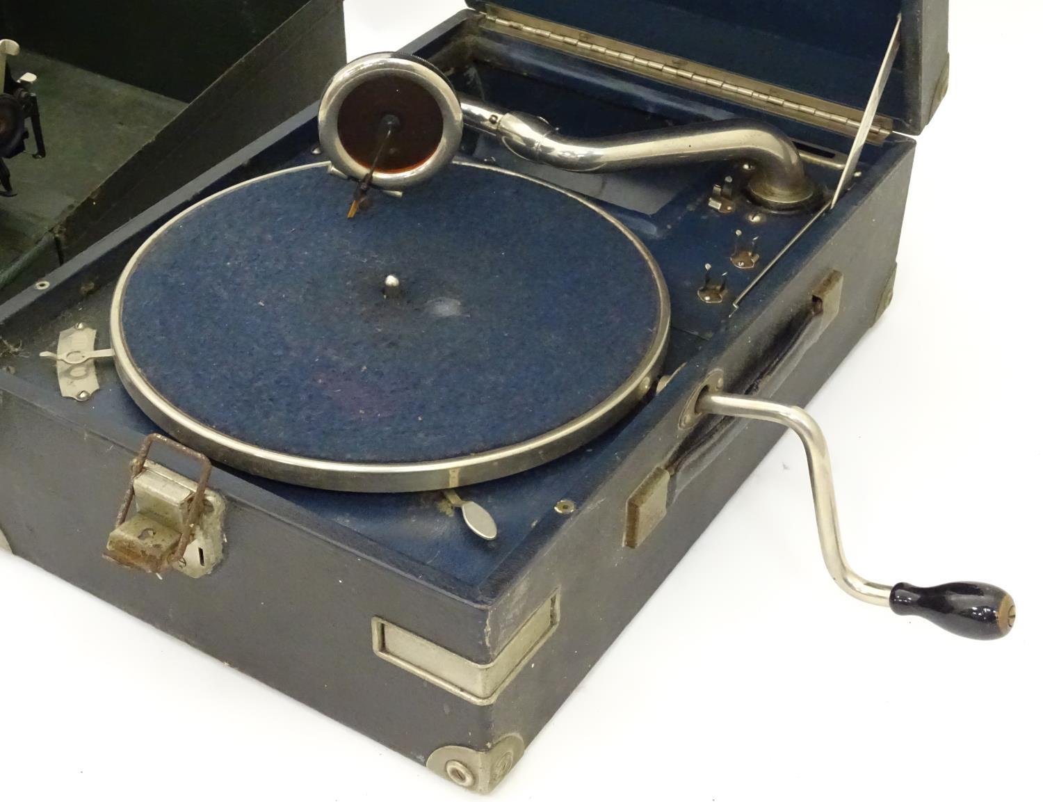 An HMV portable record player. Together with a cased Erika typewriter (2) Please Note - we do not - Image 3 of 7