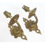 A pair of gilt light fittings Please Note - we do not make reference to the condition of lots within