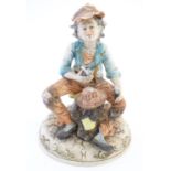 A Capodimonte figure of an elderly man with tools, possibly an armourer. Indistinctly signed to base