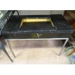 A retro desk with central lifting top and a chromed base. Approx. 37" wide Please Note - we do not