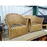 A pair of wicker armchairs. Each approx. 32" wide. (2) Please Note - we do not make reference to the