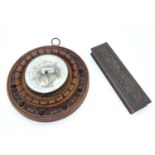 An aneroid barometer with a carved case, together with a carved wooden pen box. (2) Please Note - we