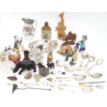 A box of miscellaneous items to include ceramics, metalware, carved wooden items etc. Please
