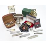 A quantity of miscellaneous items to include card marker, money box, inkwell, pen knives, button