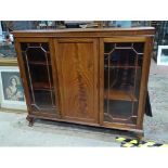 An Edwardian mahogany glazed bookcase. Approx. 53" wide Please Note - we do not make reference to