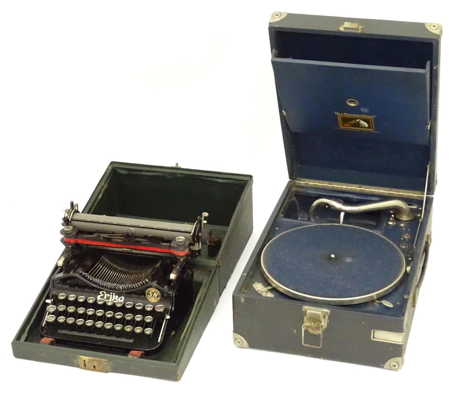 An HMV portable record player. Together with a cased Erika typewriter (2) Please Note - we do not