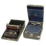 An HMV portable record player. Together with a cased Erika typewriter (2) Please Note - we do not