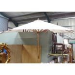 A large parasol. Approx. 7ft wide Please Note - we do not make reference to the condition of lots