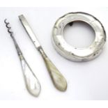 A small silver pot lid, together with 2 mother of pearl handled manicure utensils (2) Please