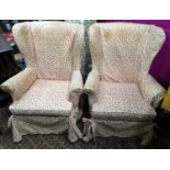 A pair of mid 20thC Parker Knoll armchairs (2) Please Note - we do not make reference to the