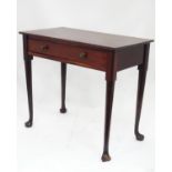 A 19thC mahogany side table with single drawer and pad feet. Approx. 30" wide Please Note - we do