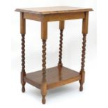 An early 20thC oak side table. Approx. 33 1/2" tall Please Note - we do not make reference to the