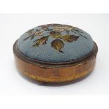 A Victorian walnut footstool of circular form with bead decoration. Approx. 11" wide Please Note -